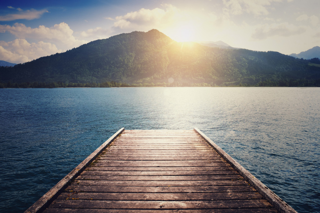 beautiful landscape with lake, moorage and hills